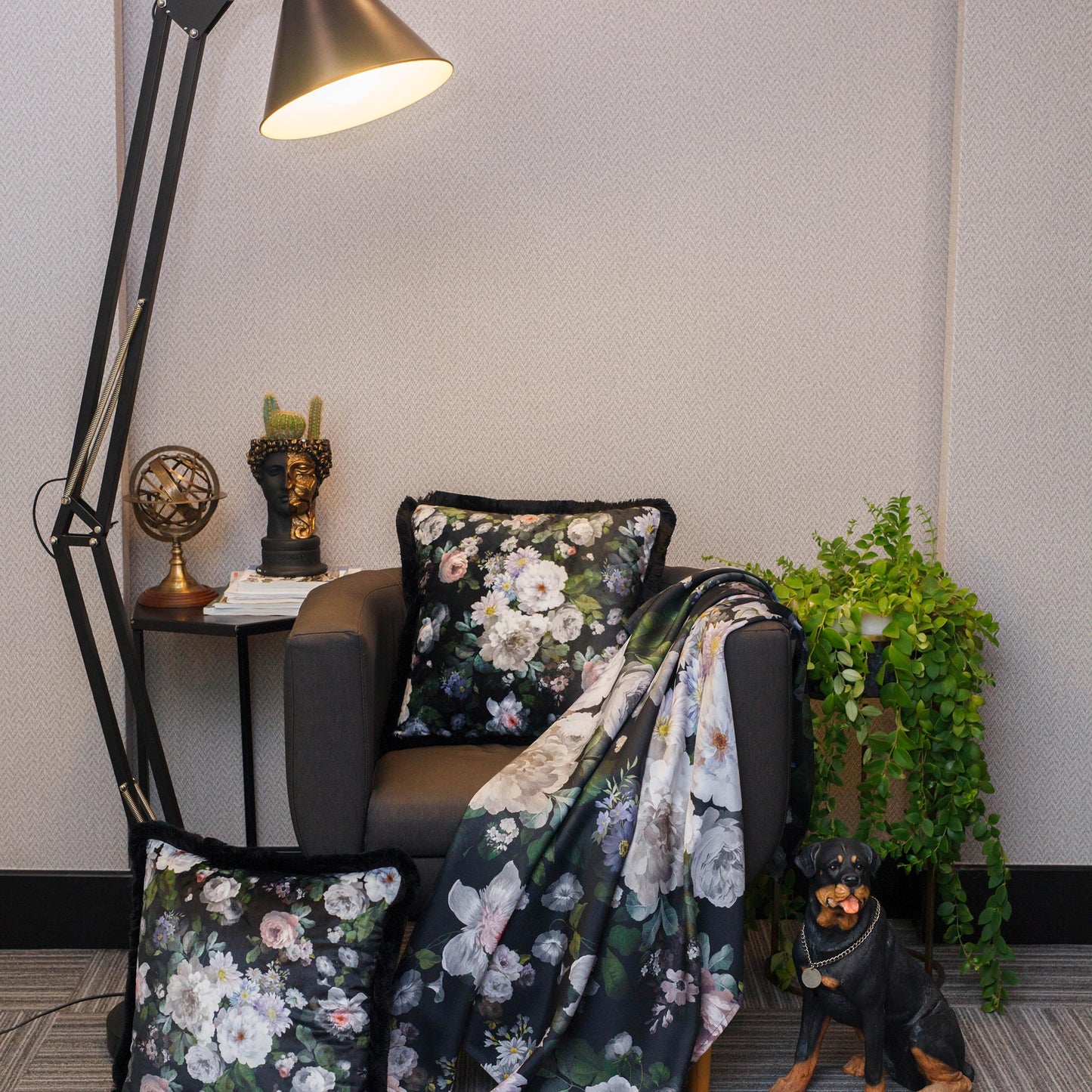 Decorative velvet pillow with a floral motif