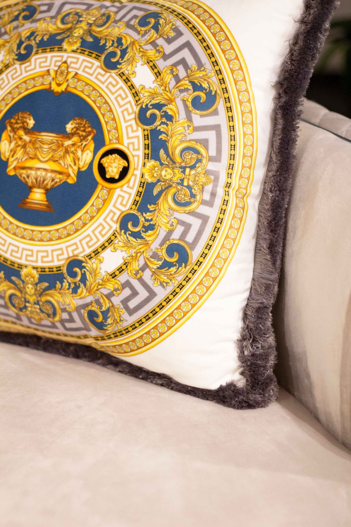 Decorative pillow with an antique motif